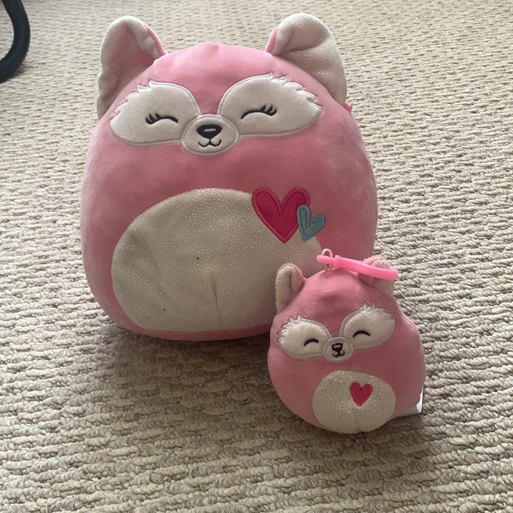 This is Flora. The is a 8 inch and clip on. She is a fox Squishmallow.
